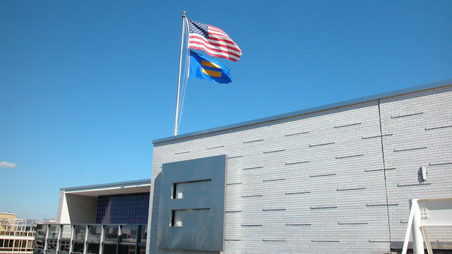HRC equality flag and logo at the HRC headquarters building.