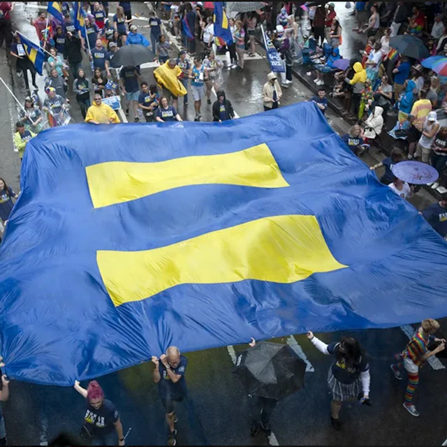 Large equality banner held by HRC volunteers
